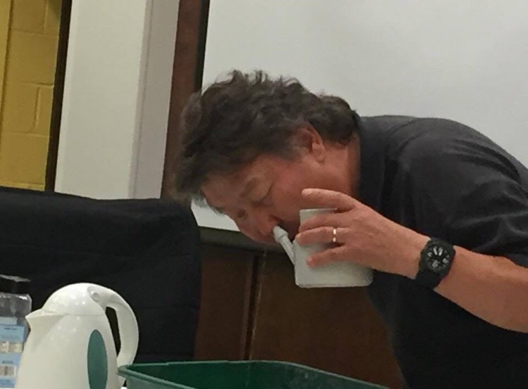 Dr. Youngsuck Kim demonstrating the use of a NetiPot - Fall 2016