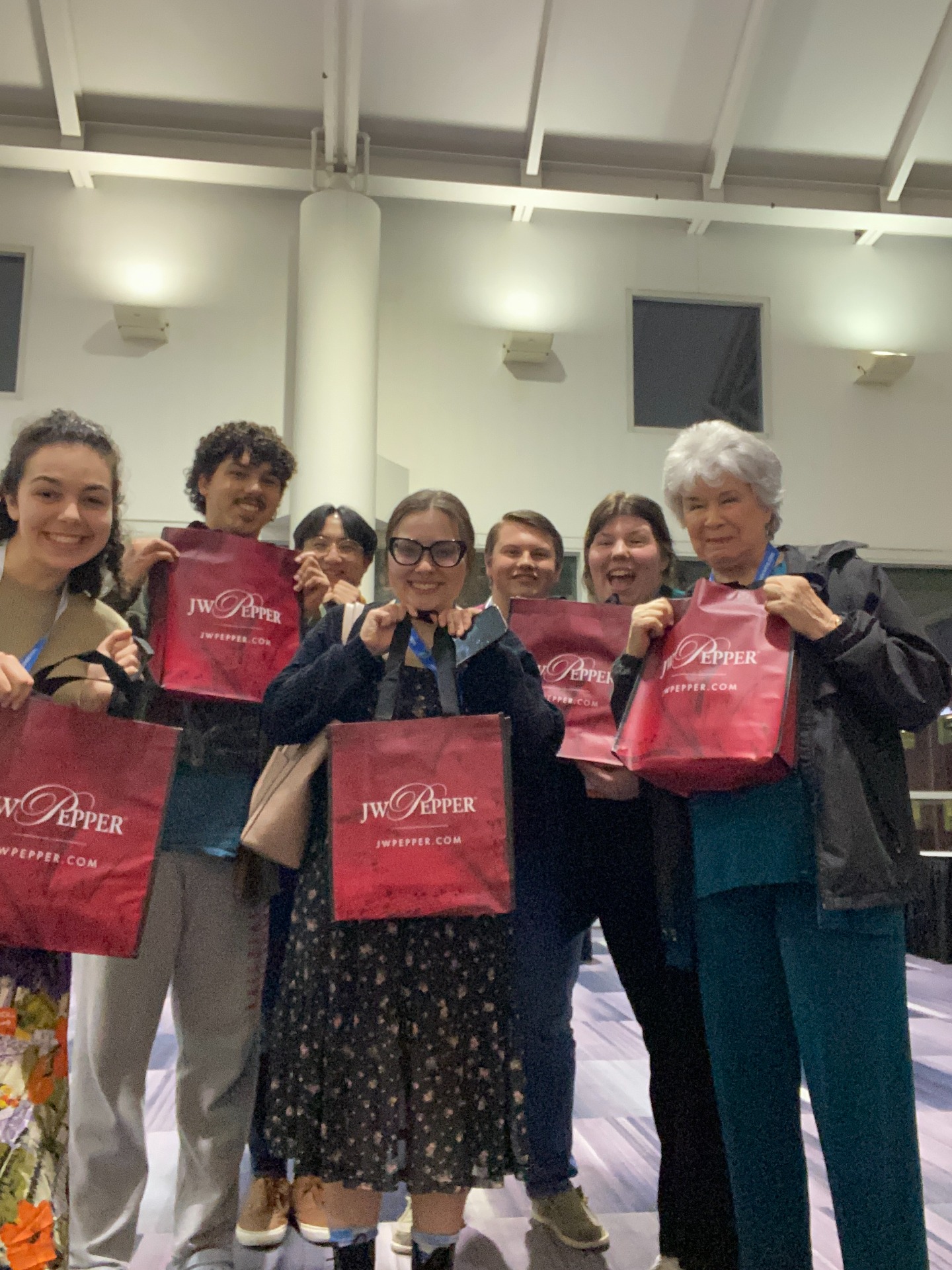 ACDA members at the 2024 conference with their J. W. Pepper bags